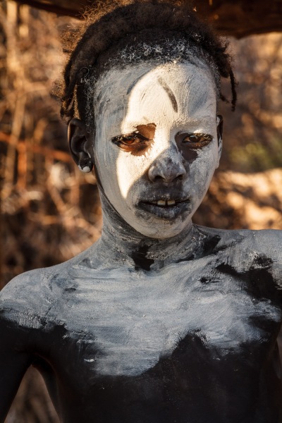 Portrait of a Dassenach Boywith white clay.