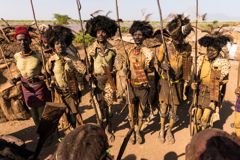 Men from the Dassanech tribe line up across from the women while they dance and sing during the Dimi ceremony.