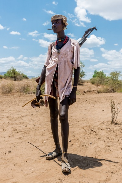 Portrait of a Hamer Man with AK-47.